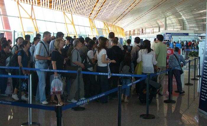 a group of people standing in a line