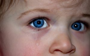 close up of a crying child's face