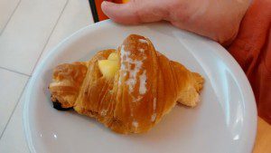 a croissant on a plate