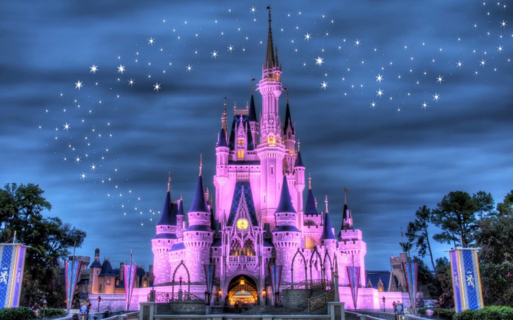 a castle with purple lights