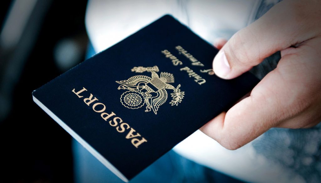 Passport in hand. You can actually get a passport in one day. 