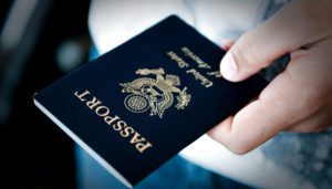 a person holding a passport