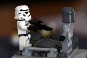 a lego figures with guns