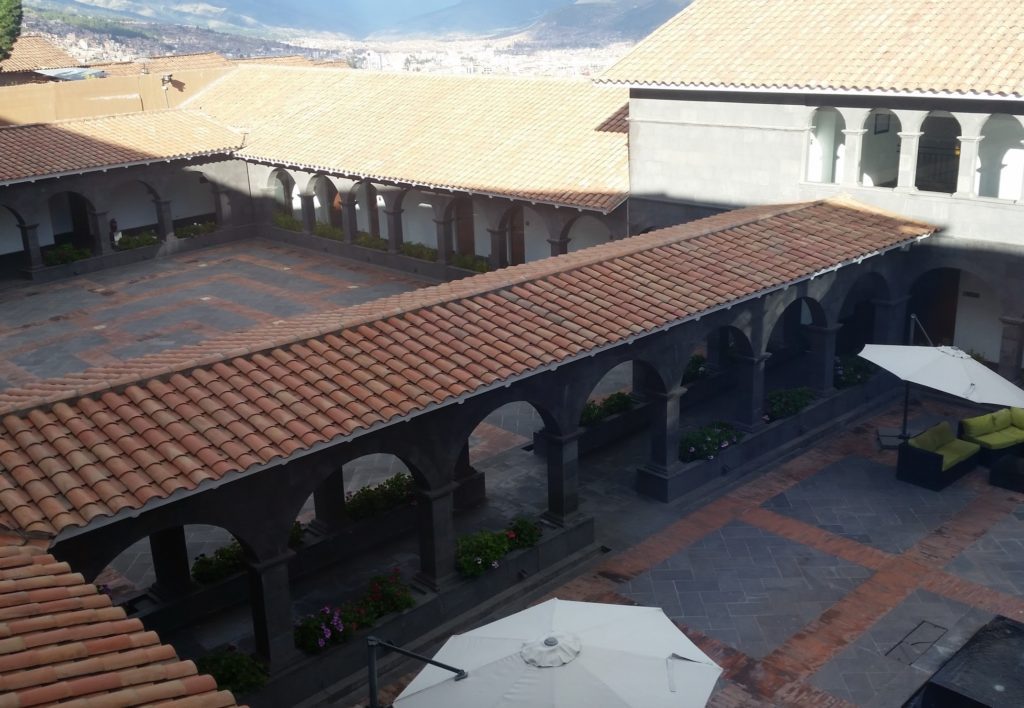 a building with a roof and a patio