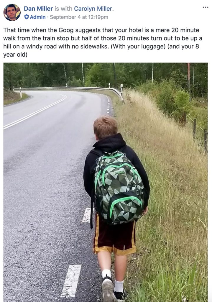 a boy walking on a road