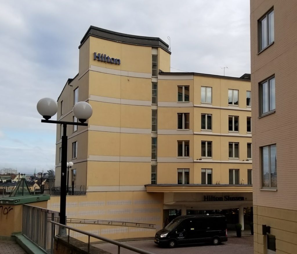 a building with a van parked in front of it