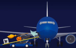 a blue airplane with a ghost on it