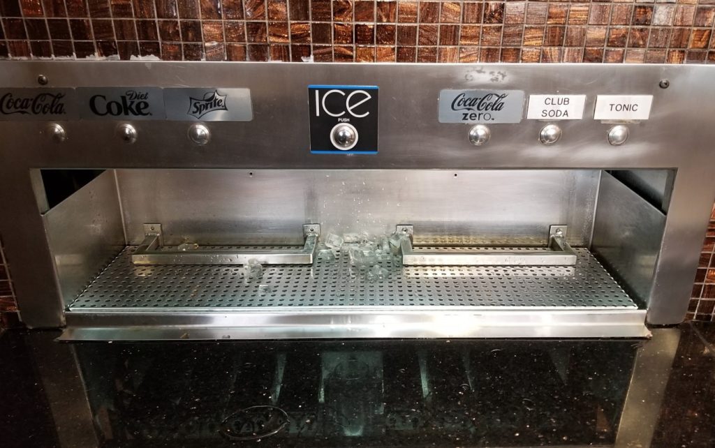 a machine with a soda dispenser