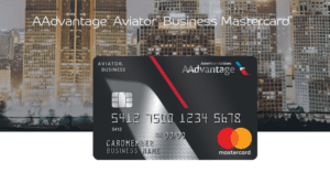 a credit card with a city behind it