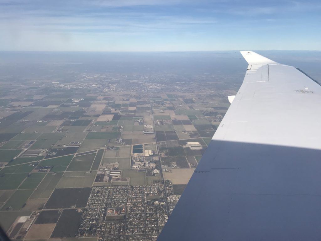 an airplane wing in the air