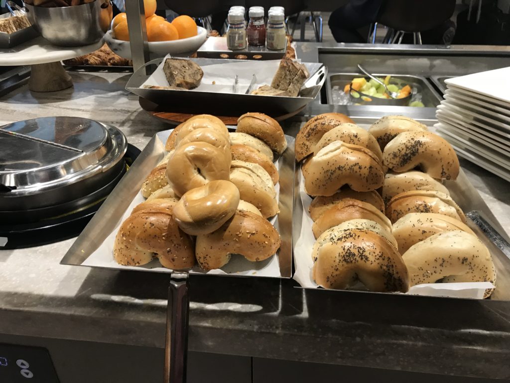 a trays of bagels on a counter