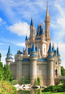 a castle with blue and white towers