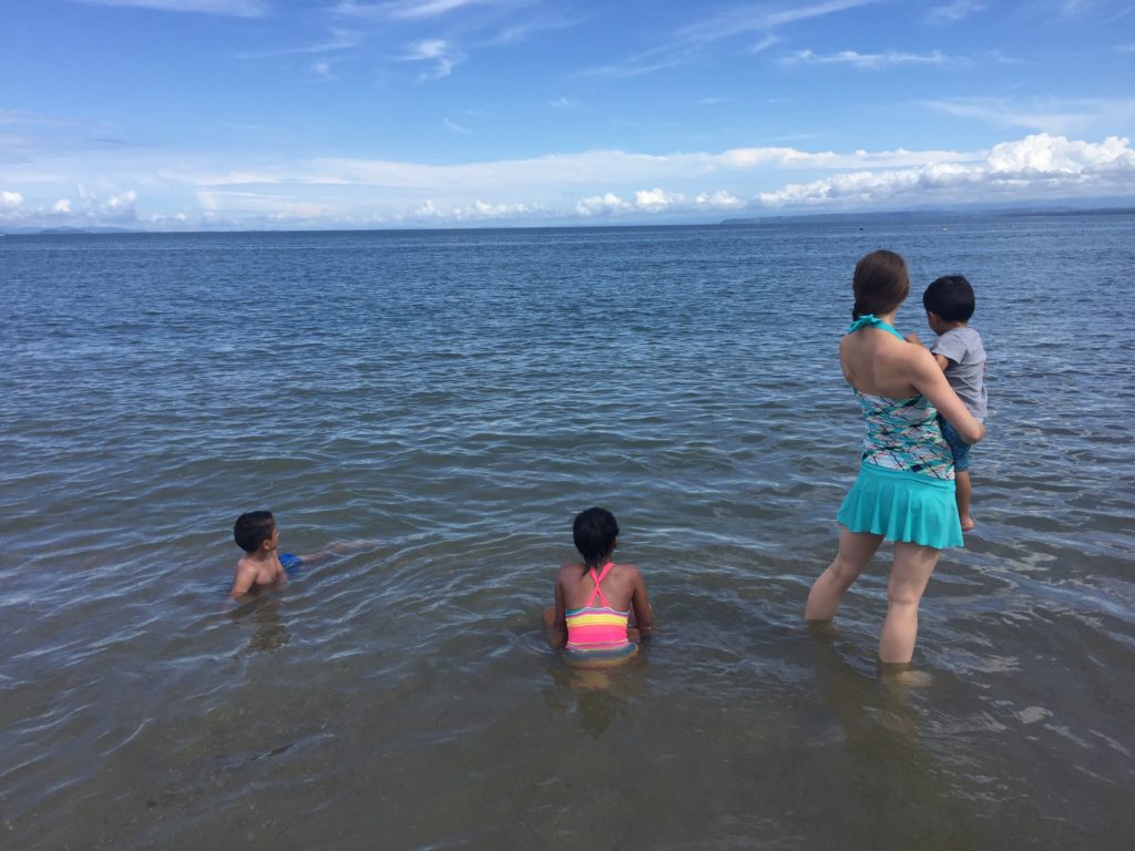 a group of children in the water