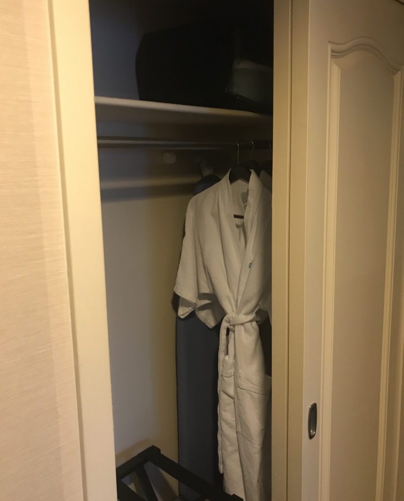 a white robe in a closet