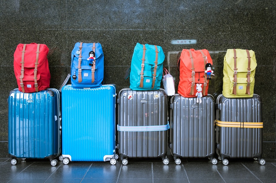 a group of luggage on top of each other
