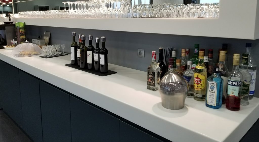 a row of bottles on a counter