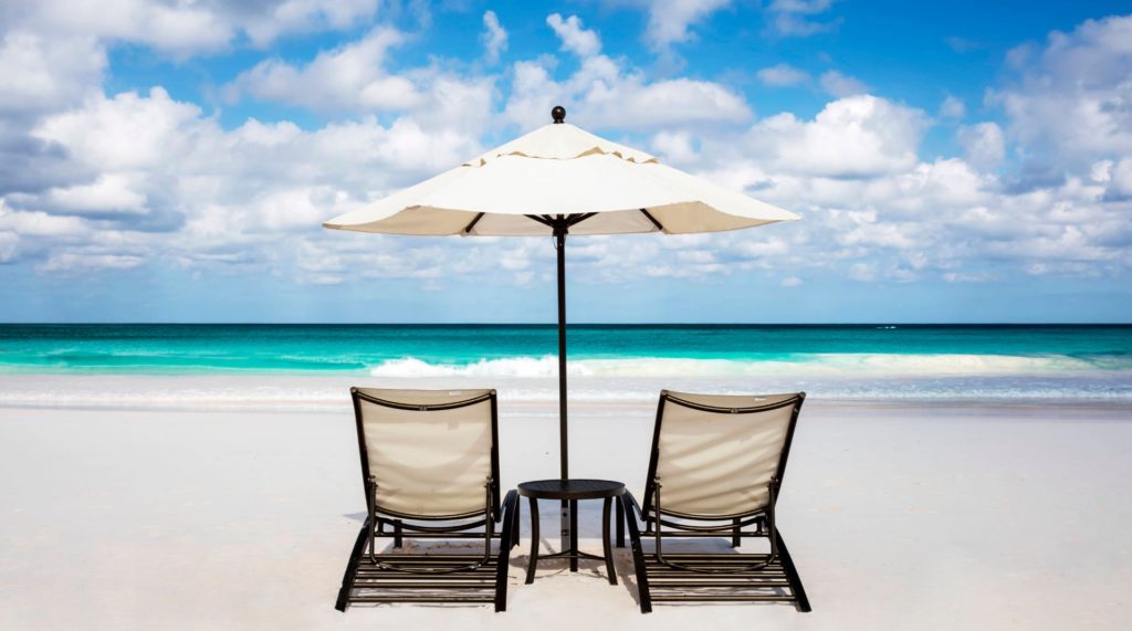 chairs and umbrella on a beach