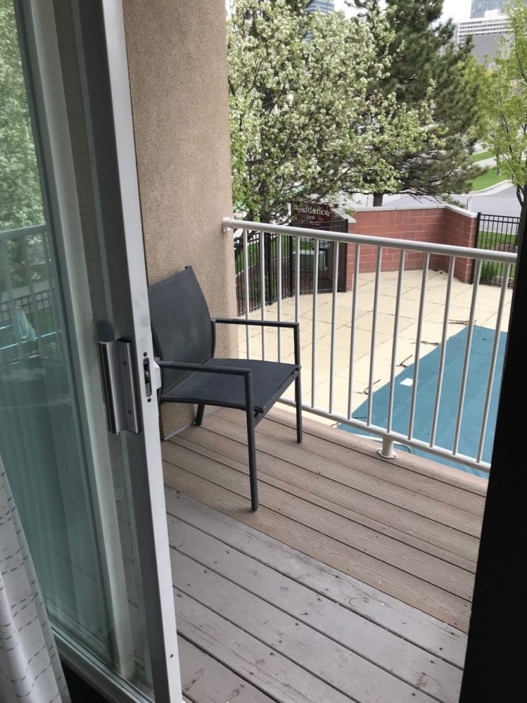 a chair on a balcony