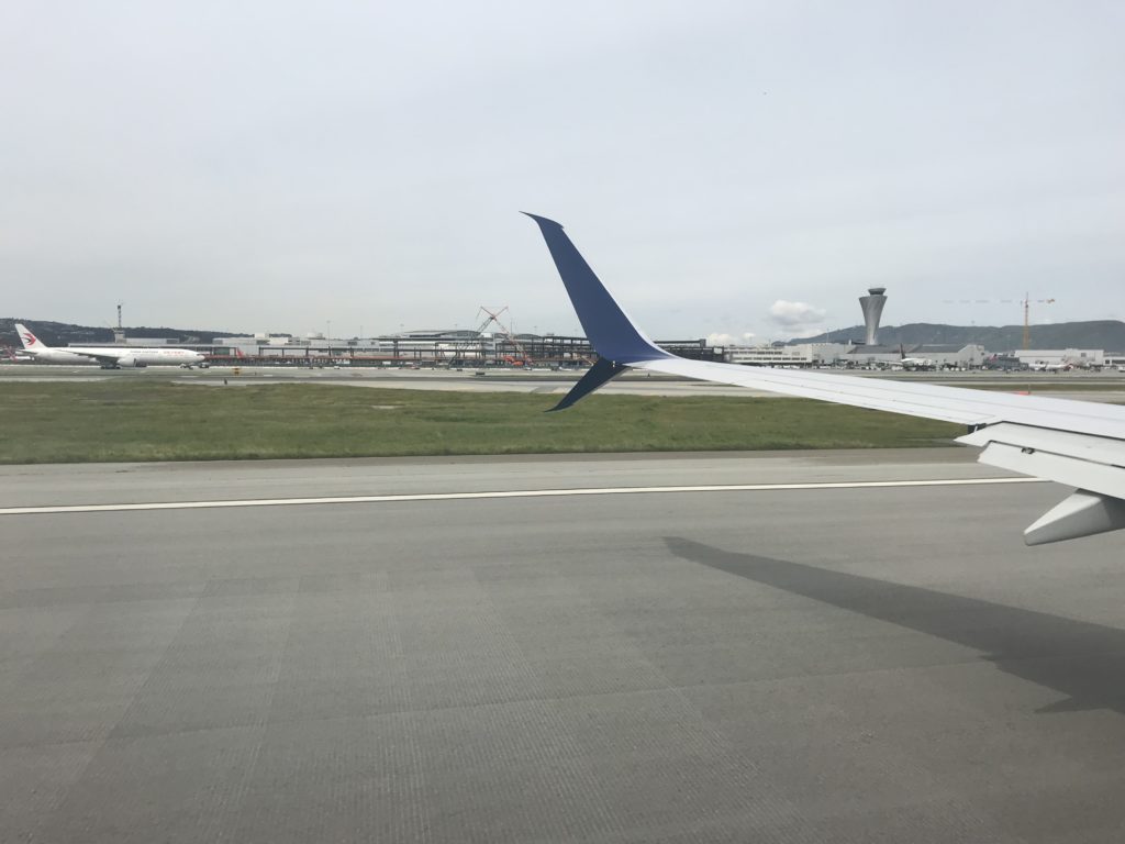 an airplane wing on a runway
