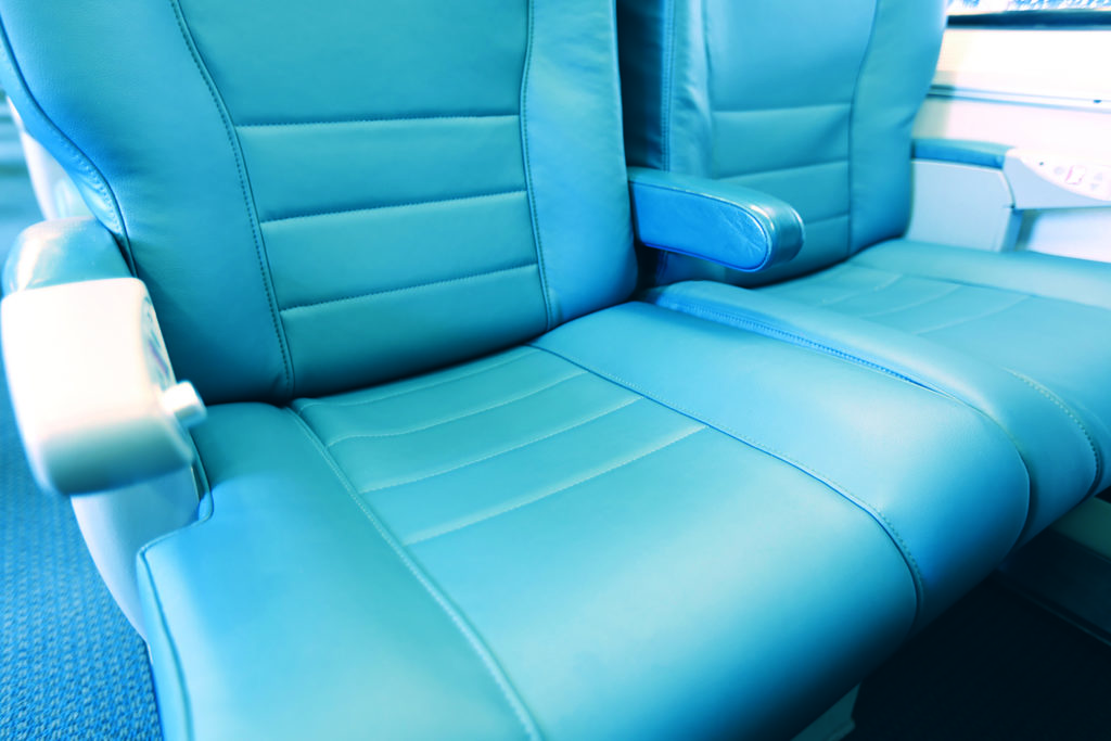 a blue seats in a plane