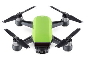 a green drone with black propellers