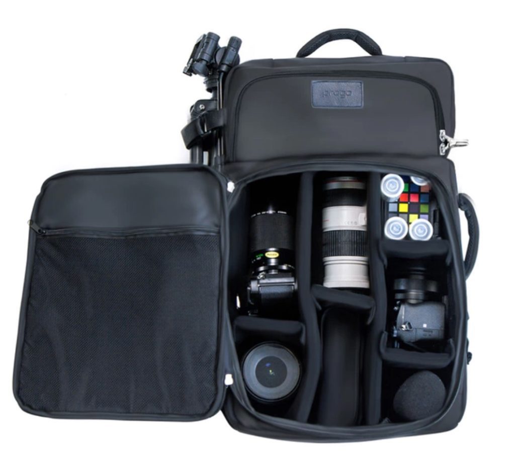 a bag with a camera and other objects inside
