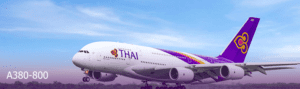 a white airplane with purple and yellow stripes