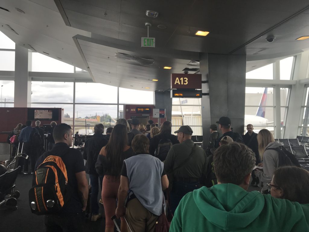 a group of people in an airport