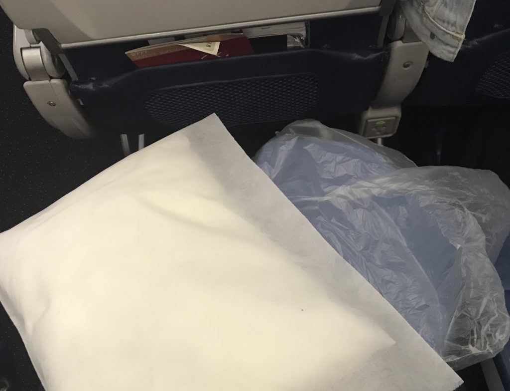 a white plastic bag on a seat