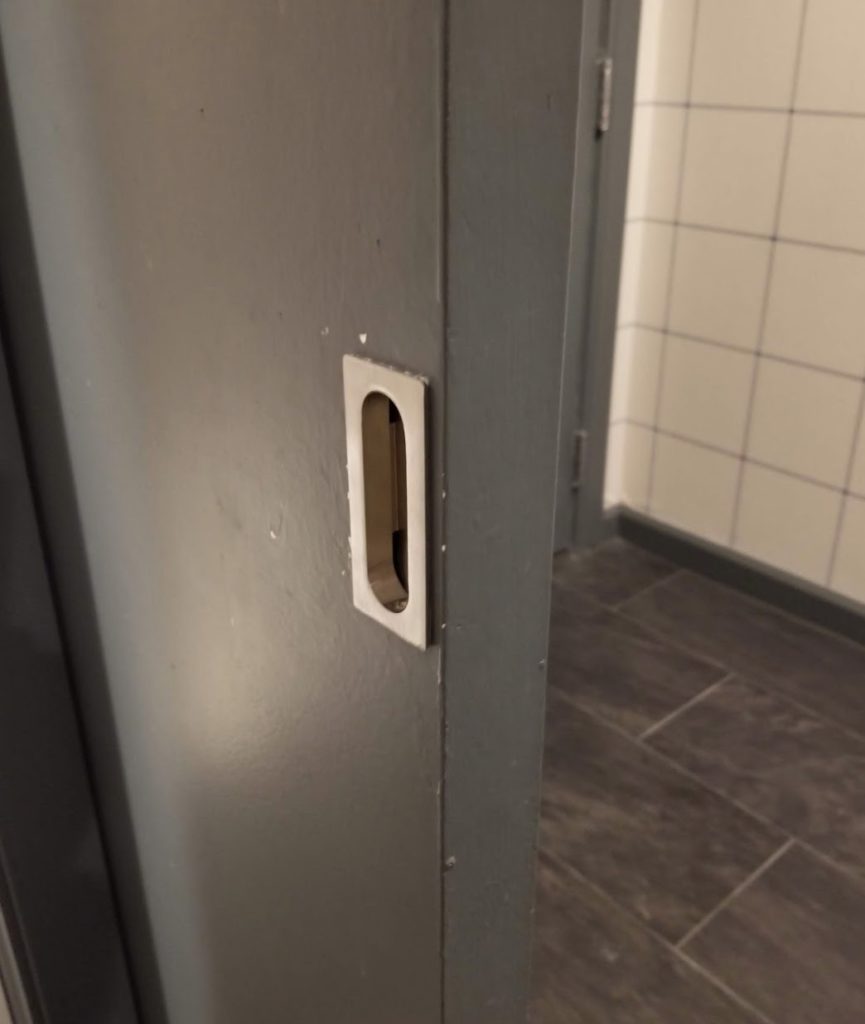 a door with a hole in it