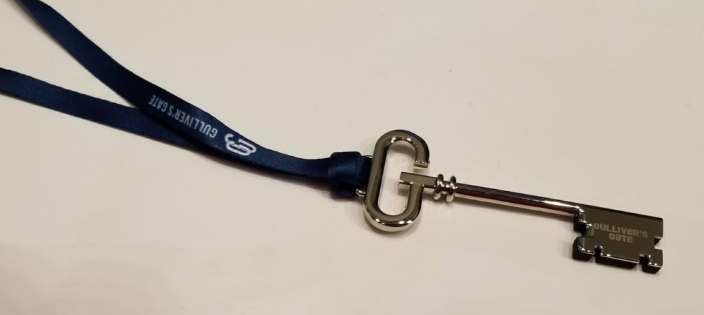 a keychain with a blue strap
