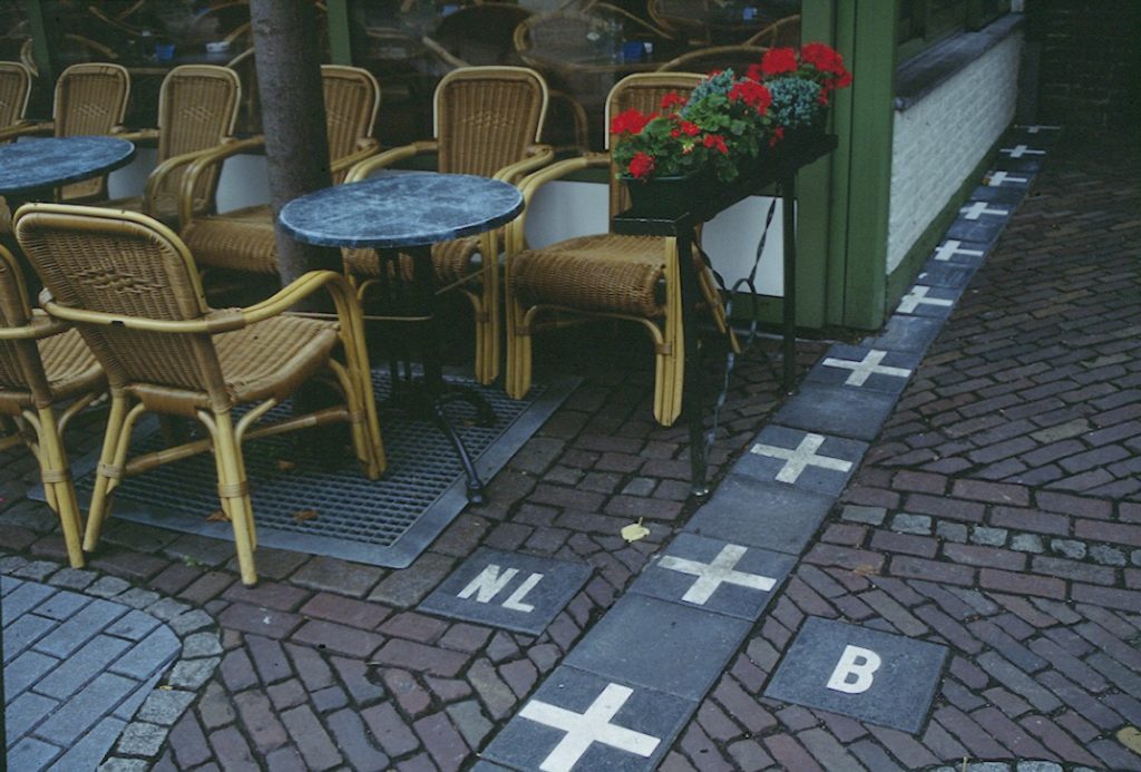 a table and chairs outside a restaurant
