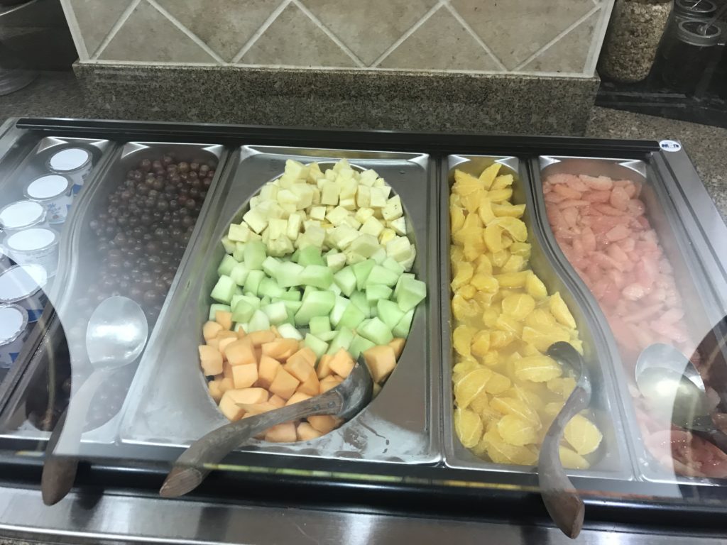 a tray of fruit in a row