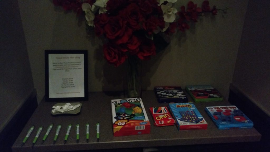 a group of games and pens on a table