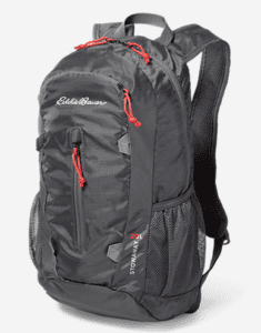 a black backpack with red zippers