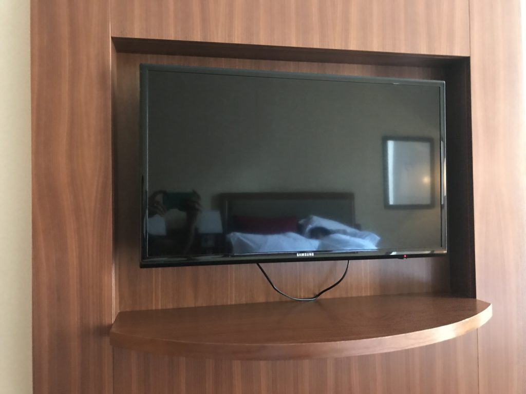 a tv on a shelf