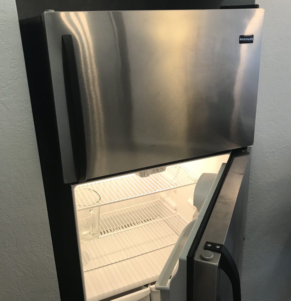 a refrigerator with a door open