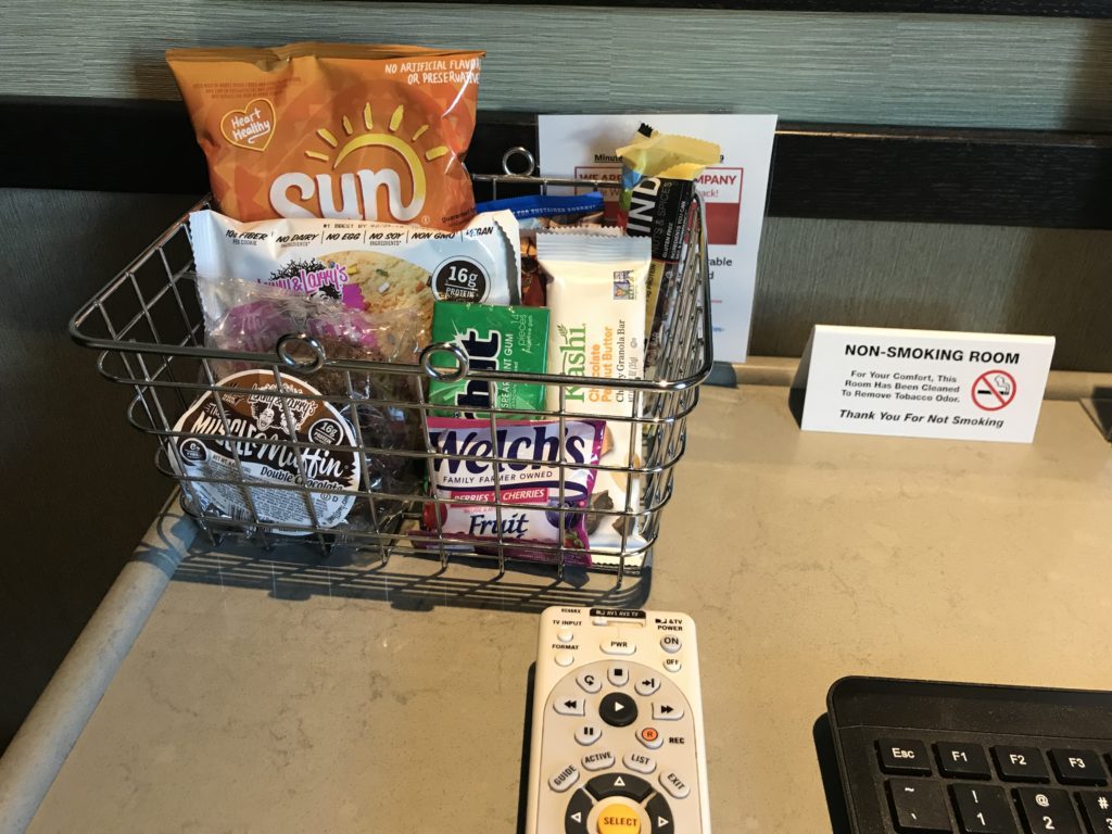 a basket of snacks and snacks on a table