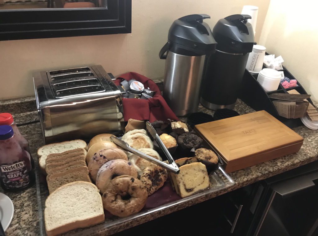 a tray of bread and toaster on a counter