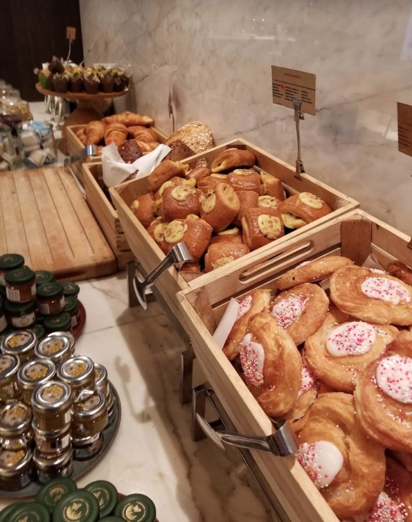 a buffet with different types of pastries