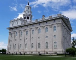 a large building with Nauvoo Illinois Temple on top