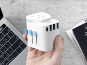 a hand holding a plug in