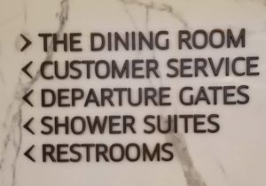 a sign on a marble surface