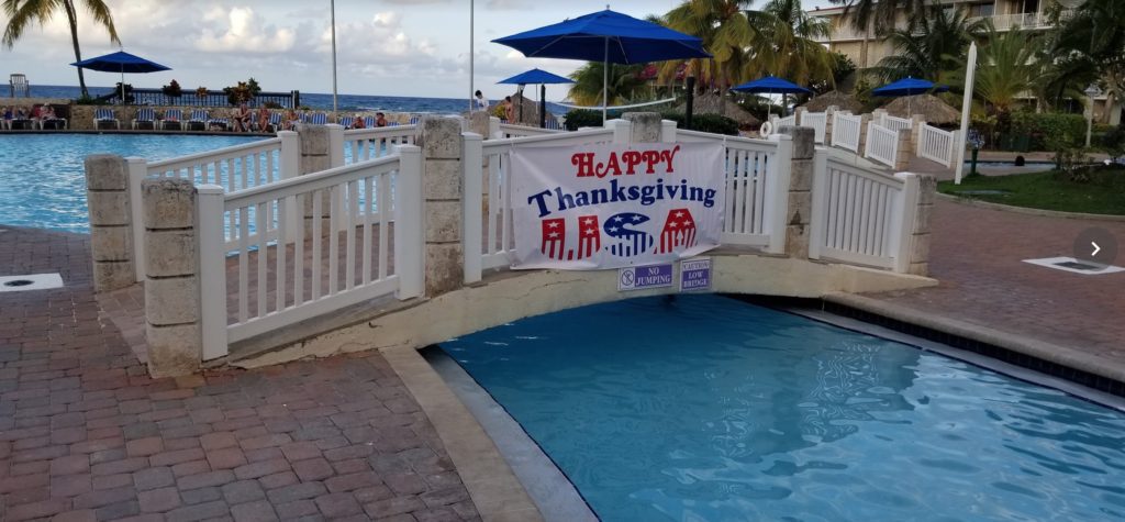 a pool with a sign over it