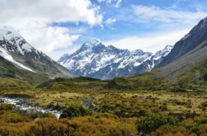 a mountain range with snow covered mountains