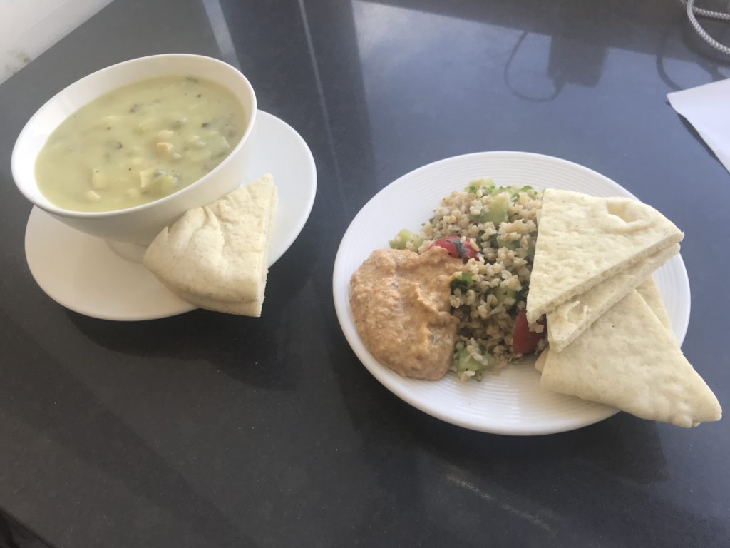 a plate of food and a bowl of soup