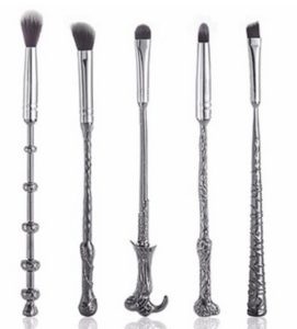 a group of makeup brushes