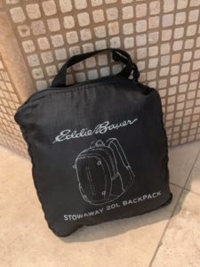 a black bag with a white design on it