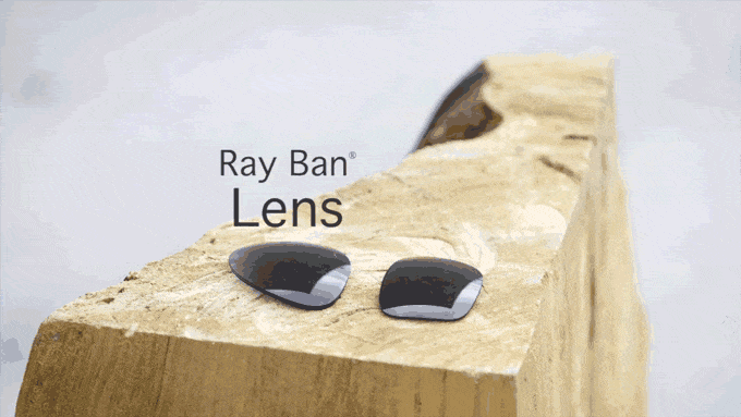 a pair of sunglasses on a wooden surface
