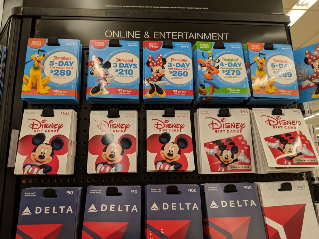 a group of gift cards on a shelf